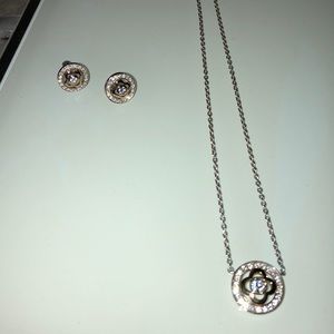 Silver and gold plated necklace and earrings.